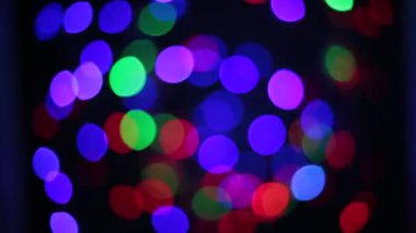 Yanıp sönen renkli daireler, alışılmadık şekil bokeh gibi çelenk