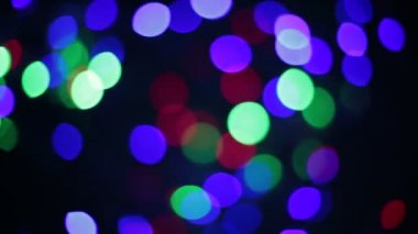 Yanıp sönen renkli daireler, alışılmadık şekil bokeh gibi çelenk