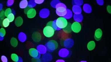 Yanıp sönen renkli daireler, alışılmadık şekil bokeh gibi çelenk