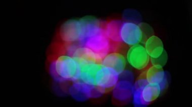 Yanıp sönen renkli daireler, alışılmadık şekil bokeh gibi çelenk