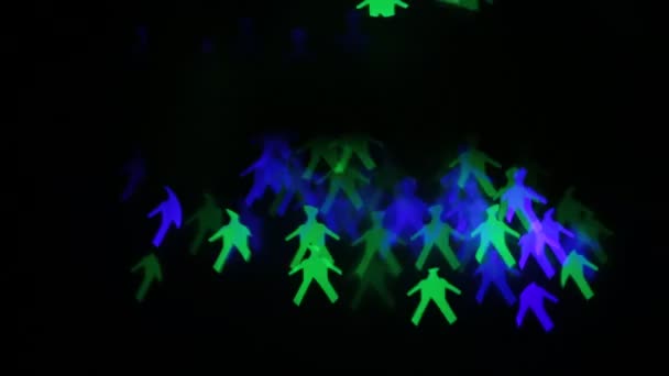 Piscando Figuras Coloridas Homens Uma Grinalda Luzes Forma Brilhante Incomum — Vídeo de Stock