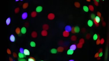 Yanıp sönen renkli daireler, alışılmadık şekil bokeh gibi çelenk