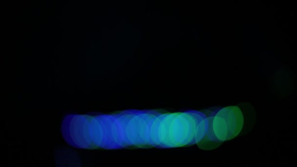 背景的散景灯在多色圆圈的形状不同明亮发光和灯泡闪烁 — 图库视频影像
