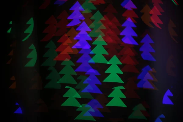 Αφηρημένο Φόντο Του Φωτεινών Πολύχρωμα Bokeh Στη Μορφή Των Χριστουγεννιάτικων — Φωτογραφία Αρχείου