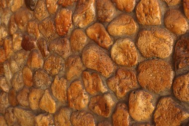 El yapımı taş duvar alışılmadık iç tasarım