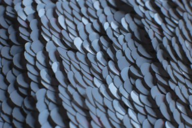 Beyaz pulların arka planı parıldıyor, parıldayan parıltılı parıltılı dokusu