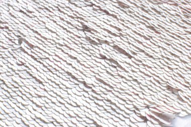 Beyaz pulların arka planı parıldıyor, parıldayan parıltılı parıltılı dokusu