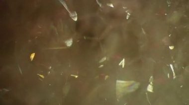 Soyut makro video arka plan sabun köpükleri, parlayan cam parçaları, parıldayan güneş ışınlı buz.