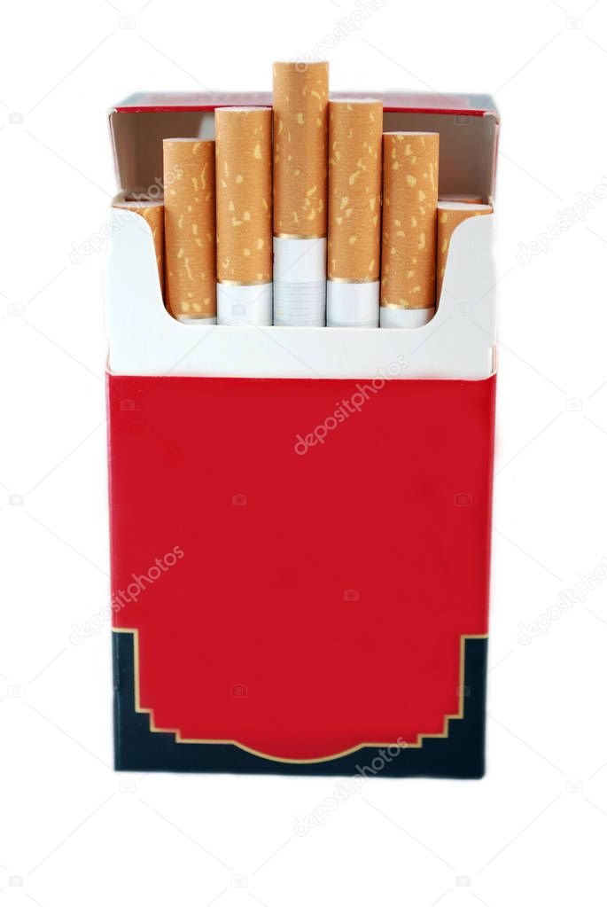 Open red full pack of cigarettes on white background. Isolated.