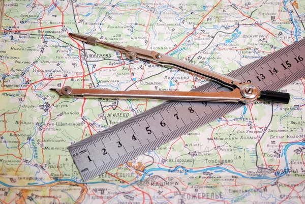 Ruler and compass on the map of Russia
