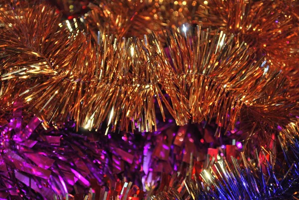 Tinsel Close Decoratie Voor Kerstboom Voor Het Nieuwe Jaar Achtergrond — Stockfoto