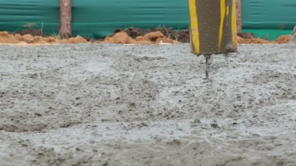 Pouring the foundation with concrete in industrial construction — Stock Video