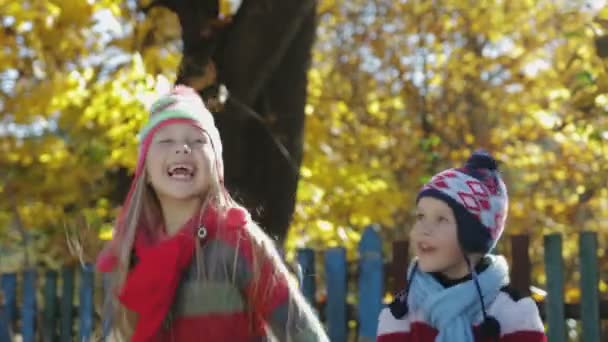 Happy autumn children in the forest Park — Stock Video