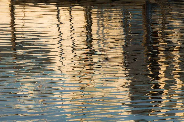 Reflection Pier Waters Lake Created Light Setting Sun Forming Different — Stock Photo, Image