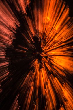 Bir patlama hatırlatan yaratıcı arka plan tam dinamikler siyah, turuncu, sarı vb..