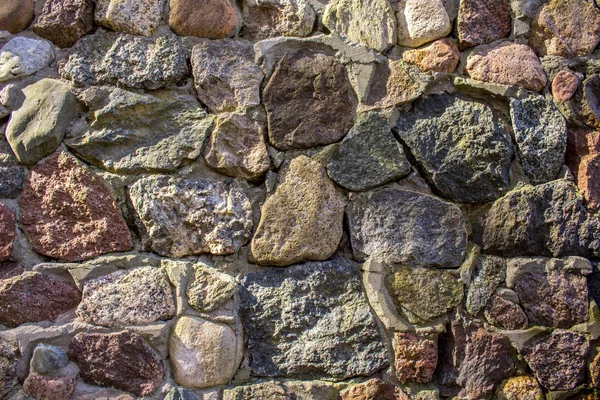 wall of large coarse stones, background, texture