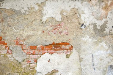 Sıva bir tuğla duvar arka plan dokusu üzerinde yuvarlanan