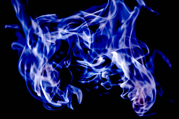 Beautiful blue tongues of flame, fire dance, background texture