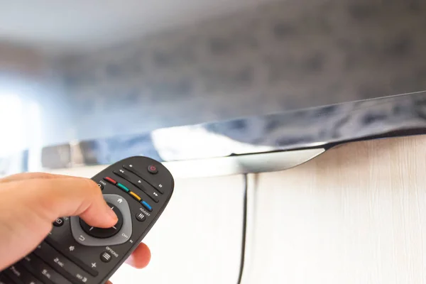 Remote Control Hand Pointing — Stock Photo, Image
