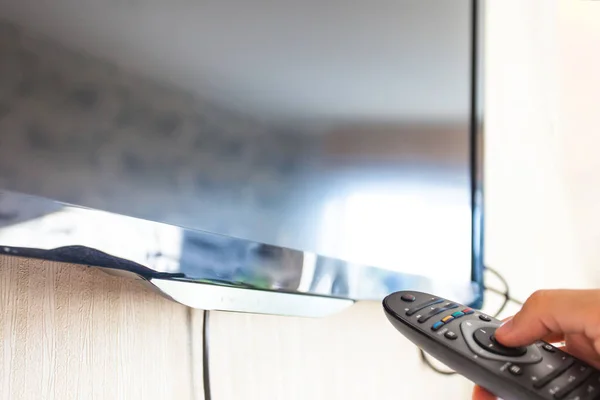 Remote Control Hand Pointing — Stock Photo, Image