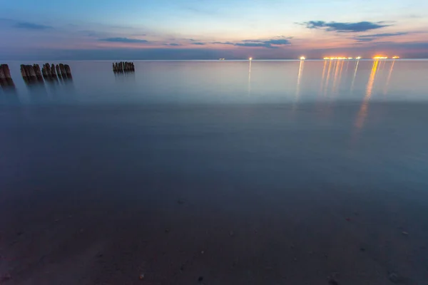 Smooth Sea Surface Breakwaters Twilight Long Exposure — Stock Photo, Image