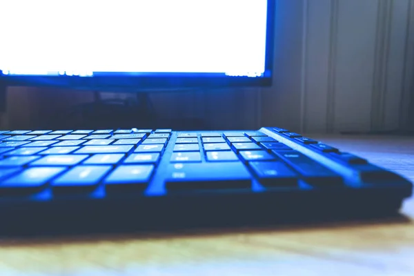 Keyboard Bright Monitor Screen Dark Room Toned — Stock Photo, Image