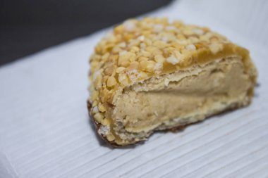 Cake sprinkled with nuts inside with excellent filling