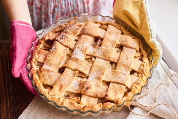 Set up, layout or still life with home made apple pie on table covered with light tablecloth on kitchen at home or studio — Stock Photo, Image