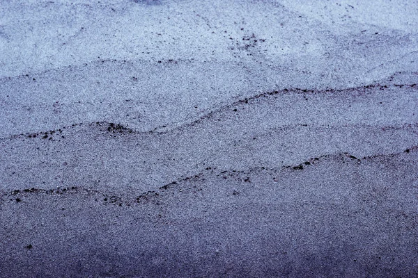 Mörka mystiska lila bakgrund med sandkorn — Stockfoto