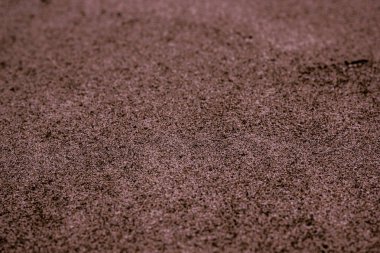 Soyut bulanık kahverengi zemin kum taneleri ile