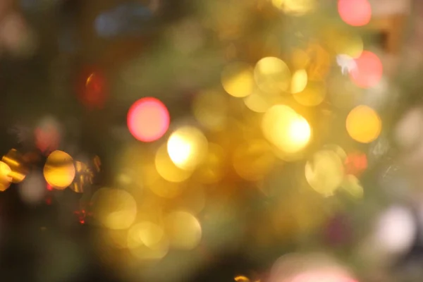 Luzes de Natal brilhantes vermelhas e laranja — Fotografia de Stock