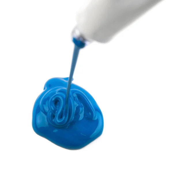 Pintar derramando de um tubo de pintura — Fotografia de Stock