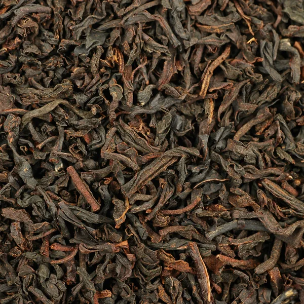 Superfície coberta com folhas de chá — Fotografia de Stock