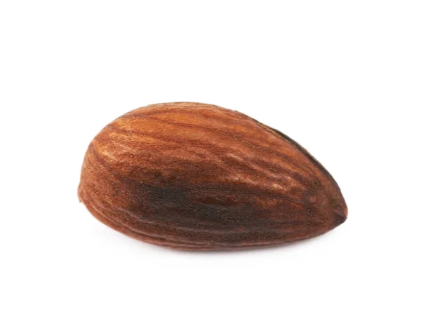 Один жареный миндаль орех изолирован — стоковое фото