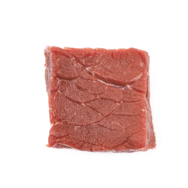 Fragment z surowej wołowiny mięso na białym tle — Zdjęcie stockowe