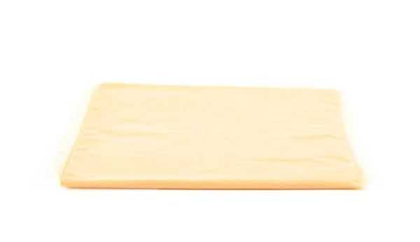 Plasterek sera topionego, na białym tle — Zdjęcie stockowe