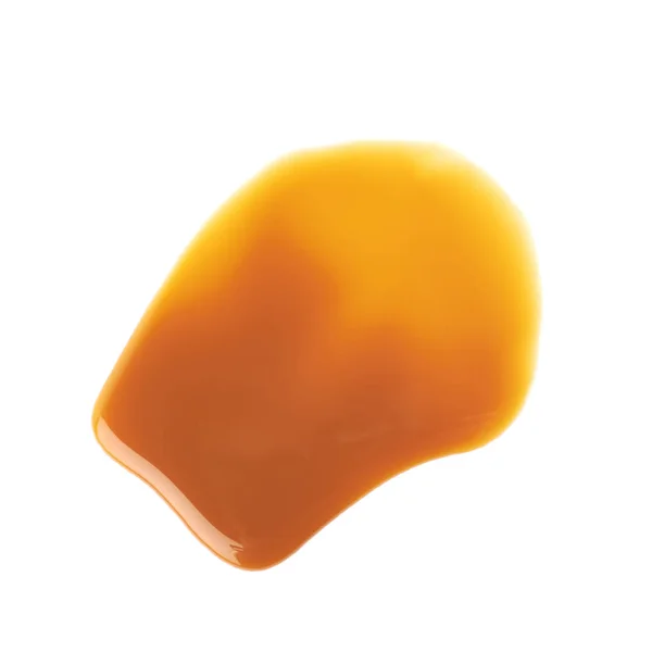 Spritzer Karamellsoße isoliert — Stockfoto