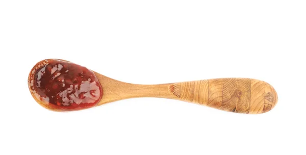 Wooden spoon of jam isolated — Stock Photo, Image