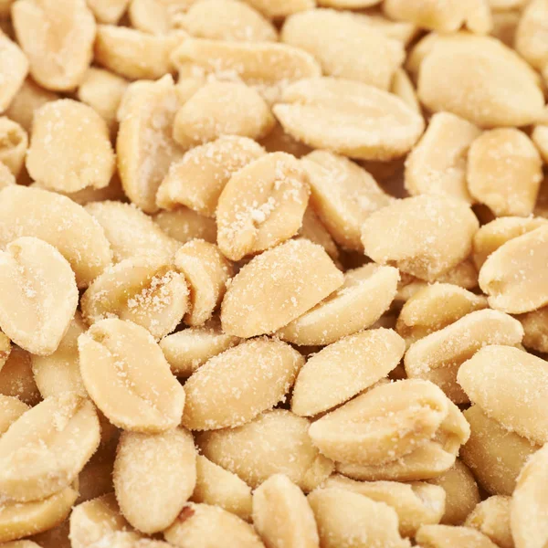 Superfície revestida com amendoins salgados — Fotografia de Stock