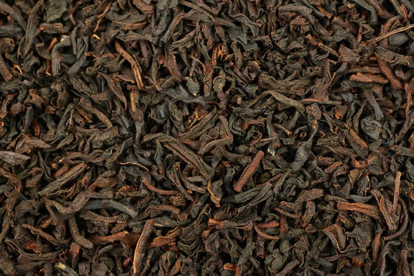 Superfície coberta com folhas de chá — Fotografia de Stock