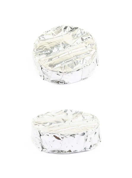 Foil wrapped brie cheese isolated — Stock Photo, Image