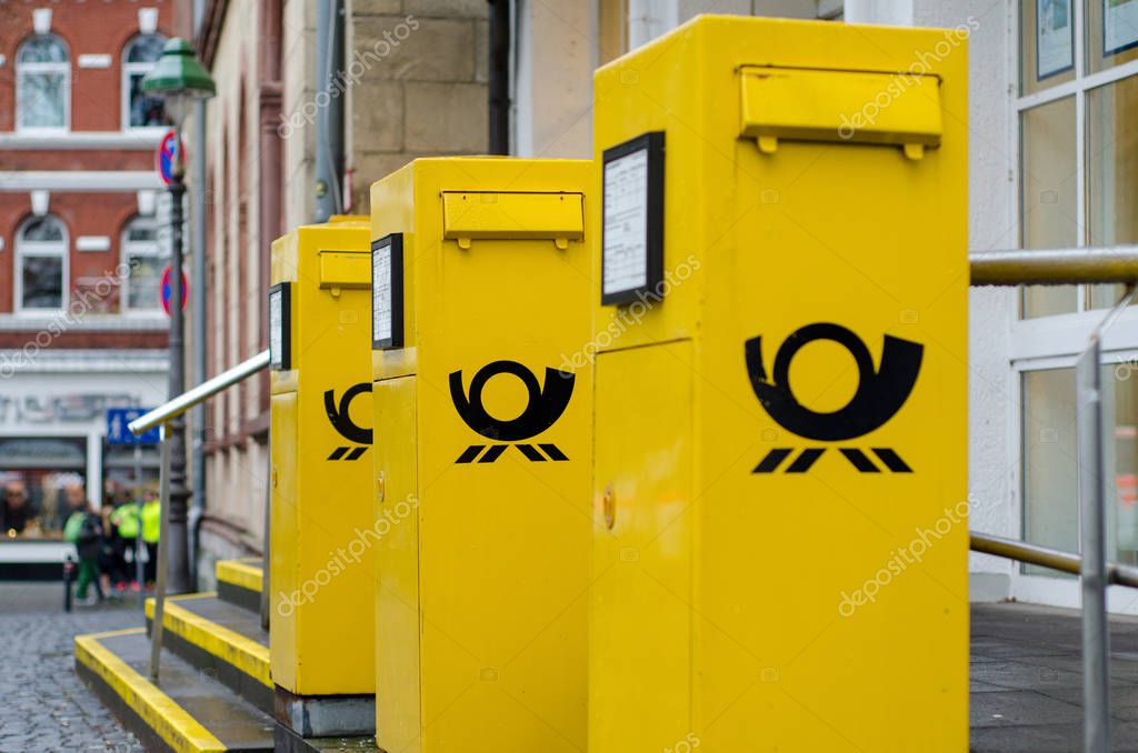 Soest, Germany - December 31, 2018: Deutsche Post Mailboxes. The Deutsche Post AG, operating under the trade name Deutsche Post DHL Group, is a German postal service and international courier service.