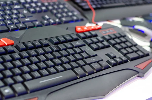 Close-up of gaming keyboards in the shop.