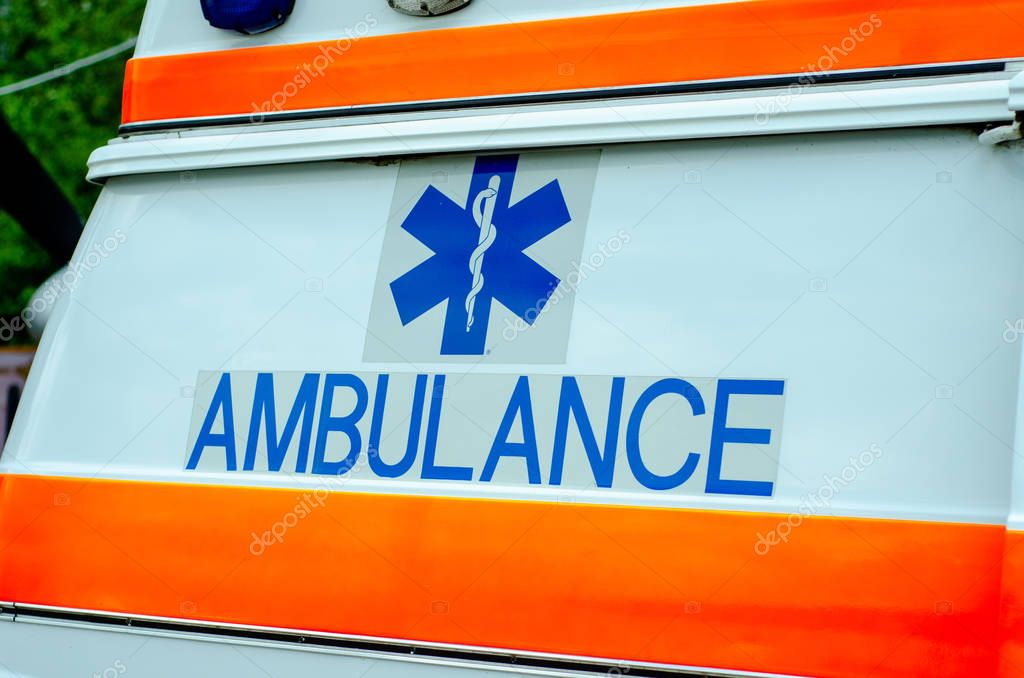 Close-up of ambulance Logo on Car