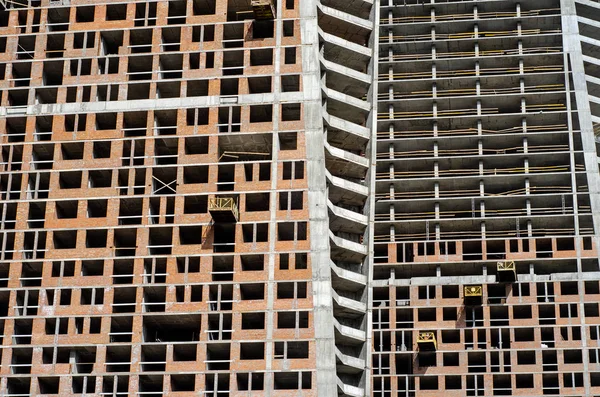 Close-up do edifício arranha-céus em construção . — Fotografia de Stock