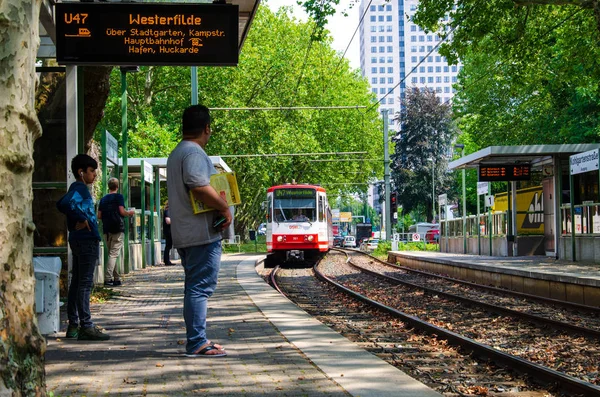 Dortmund, Germany - August 2, 2019: Dortmund Metro Known as Stadtbahn. Kohlgartenstrae station (Line U47).  People waiting to board train at the subway station. — Stock Photo, Image