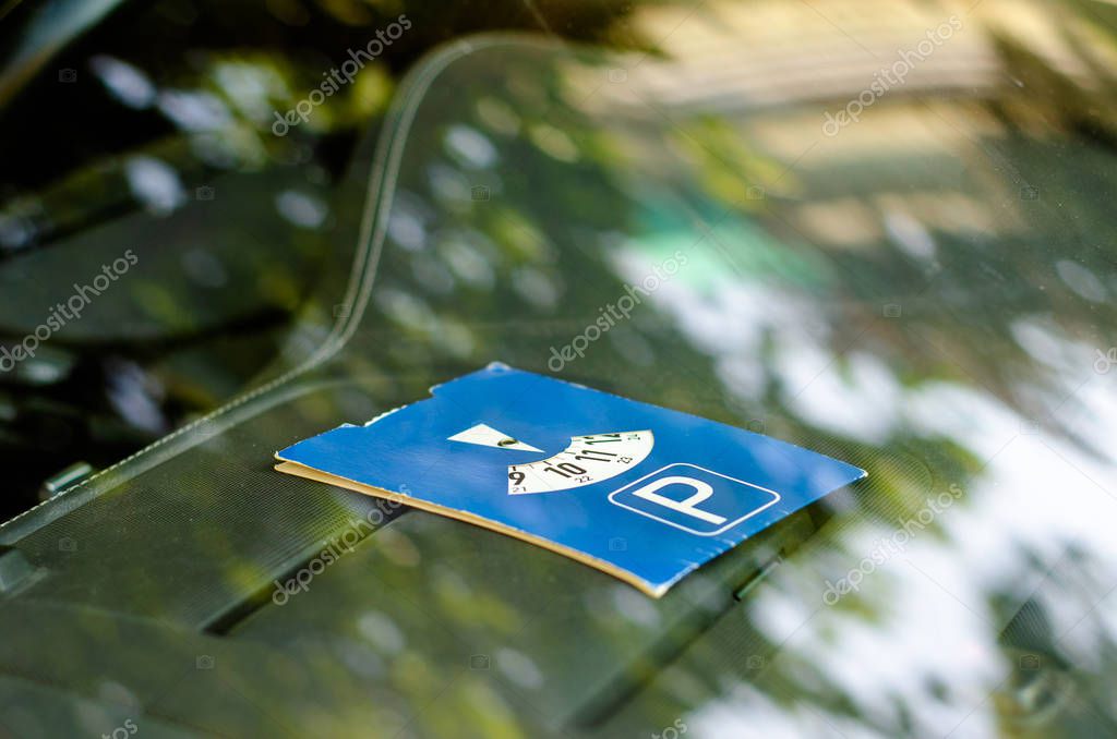Disc parking is a system of allowing time-restricted free parking through display of a parking disc or clock disc showing the time at which the vehicle was parked.