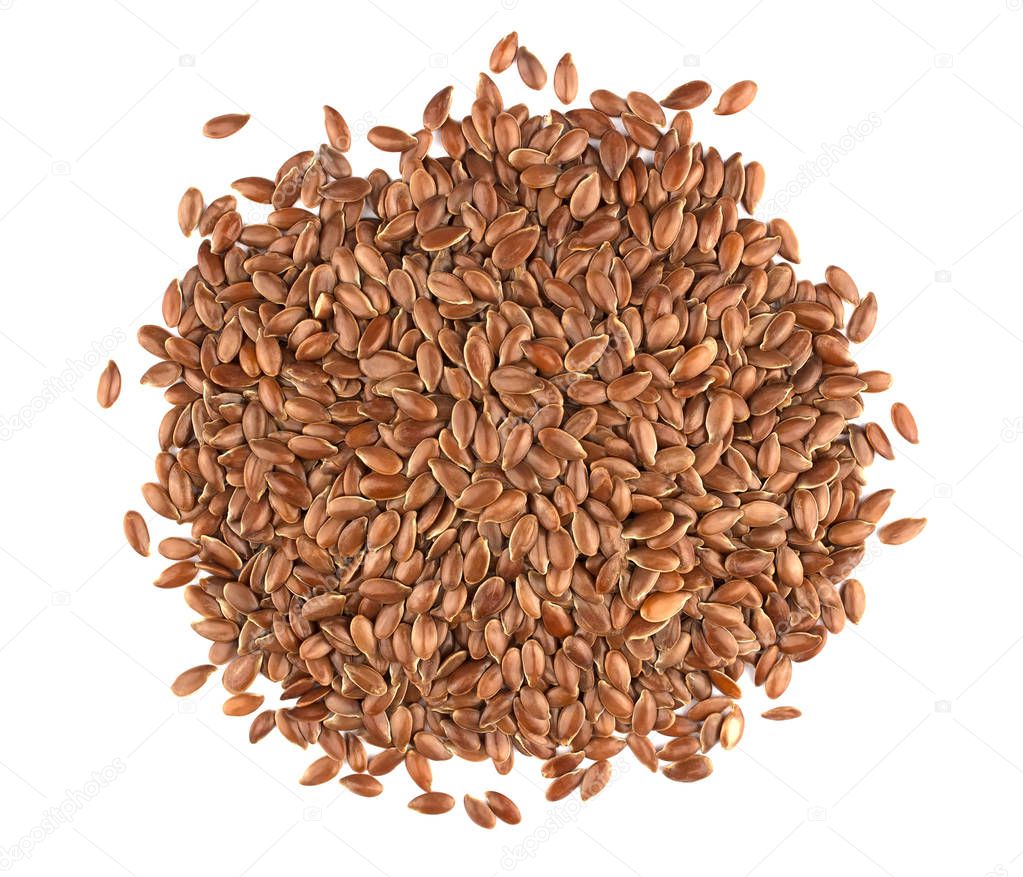 Flax seeds isolated on white background. Also known as Linseed, Flaxseed and Common Flax. Pile of grains, isolated white background.
