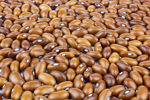 Colored haricot beans closeup on a background, top view, beans background. 