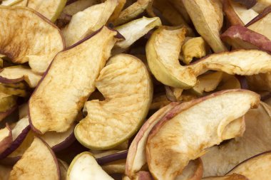 Dilimlenmiş elma arka plan, lezzetli, doğal kurumuş. Arka plan elma kurutulmuş. 